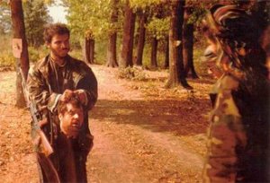 Photo of Saudi Arab IslamistTerrorists beheading Serbs in Bosnia, 1992.1